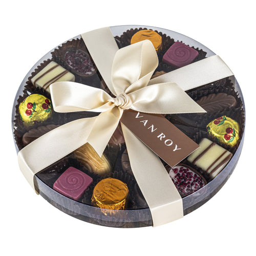 Assorted Belgian chocolates in 18cm clear round with ribbon 300g
